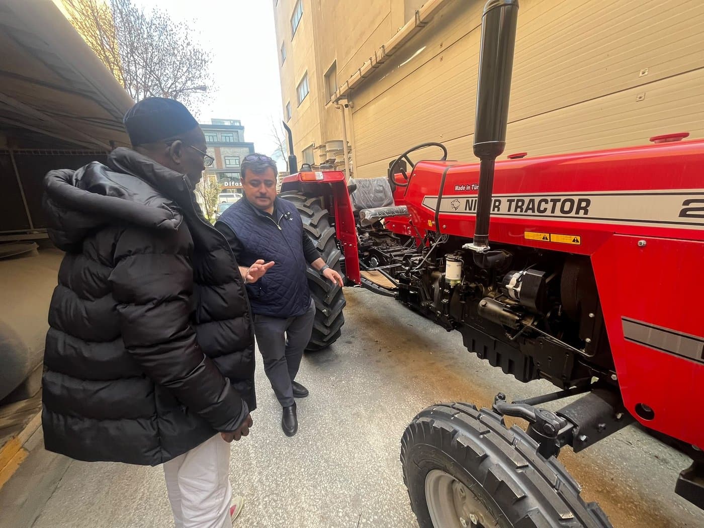 Visiting an engine components workshop during a sourcing trip