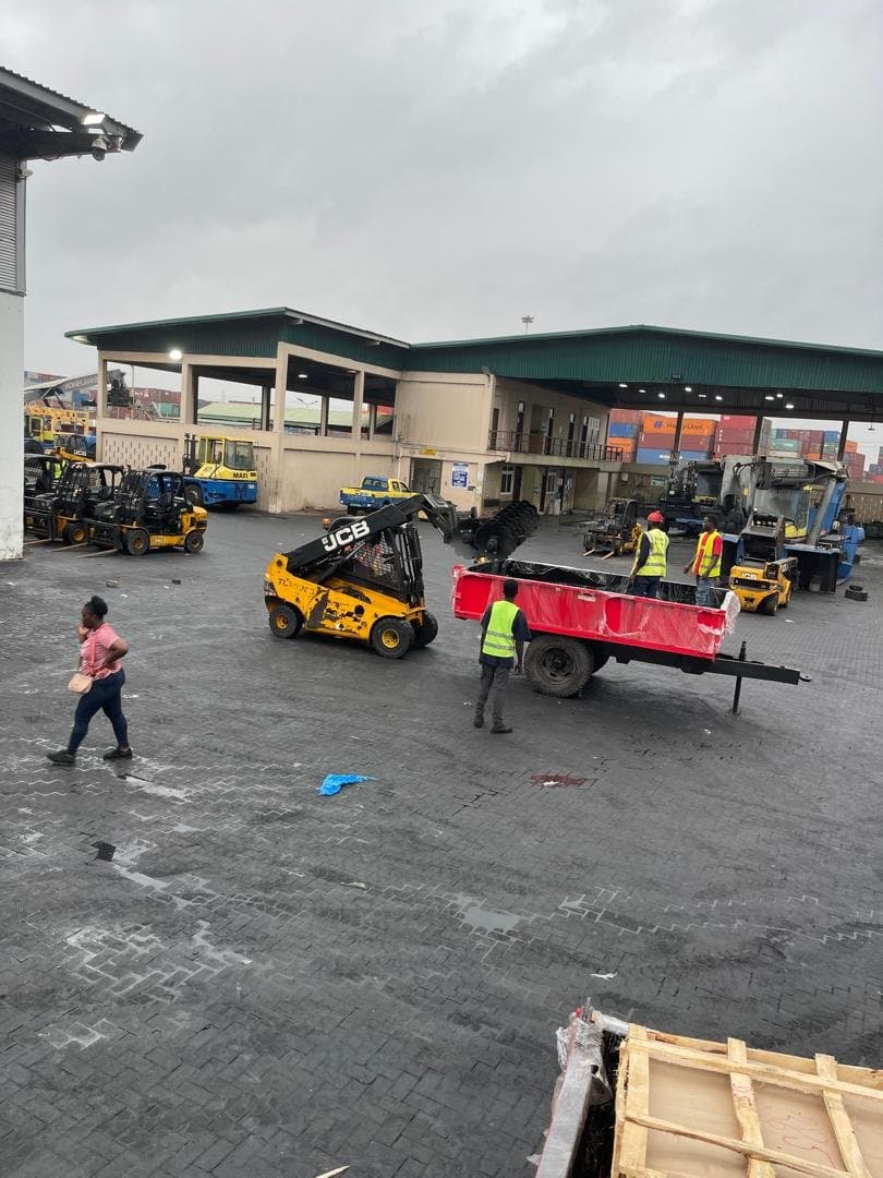 Trailer and forklift activity in the port logistics yard