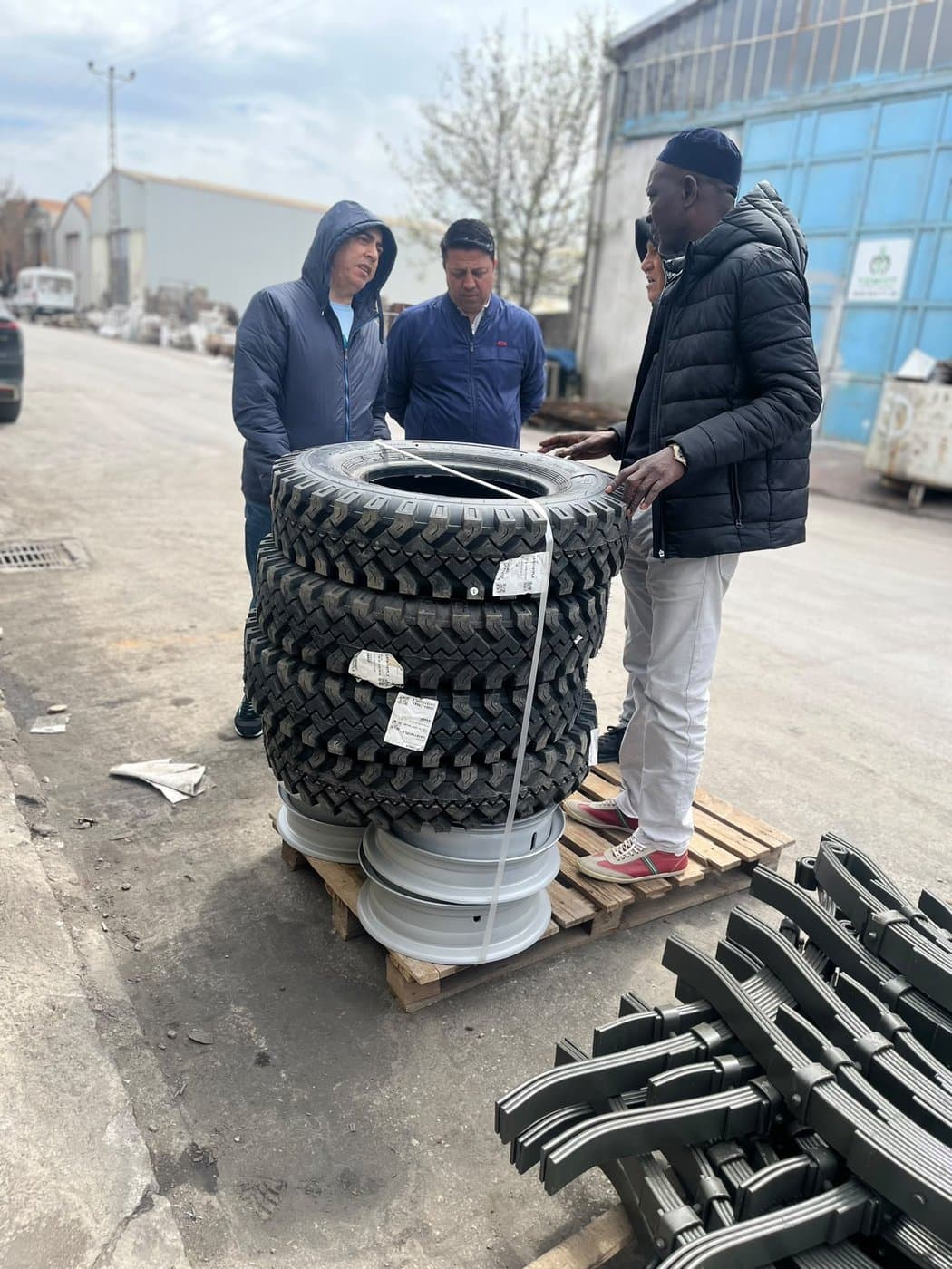 Inspecting a new tractor during an international sourcing visit