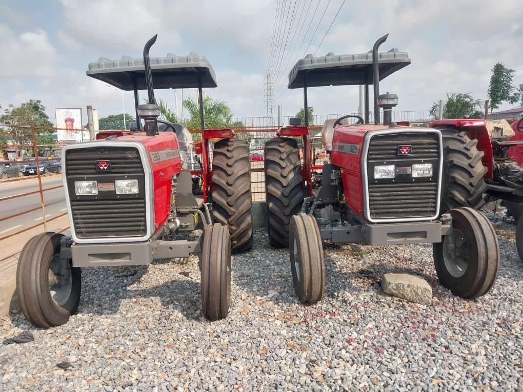 Two Massey Ferguson 385 tractors parked side by side